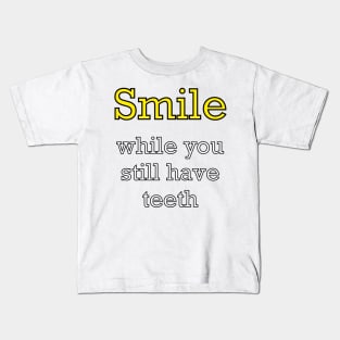 Inspirational motivational affirmation? Smile while you still have teeth - funny sarcasm motivational positivity Kids T-Shirt